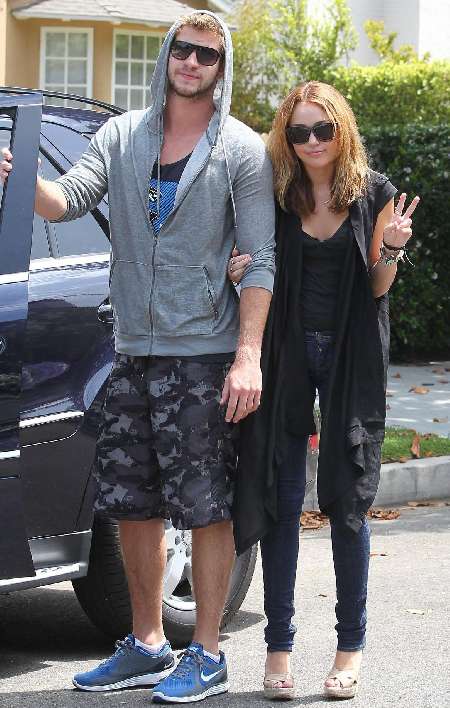 Miley Cyrus with Liam Hemsworth